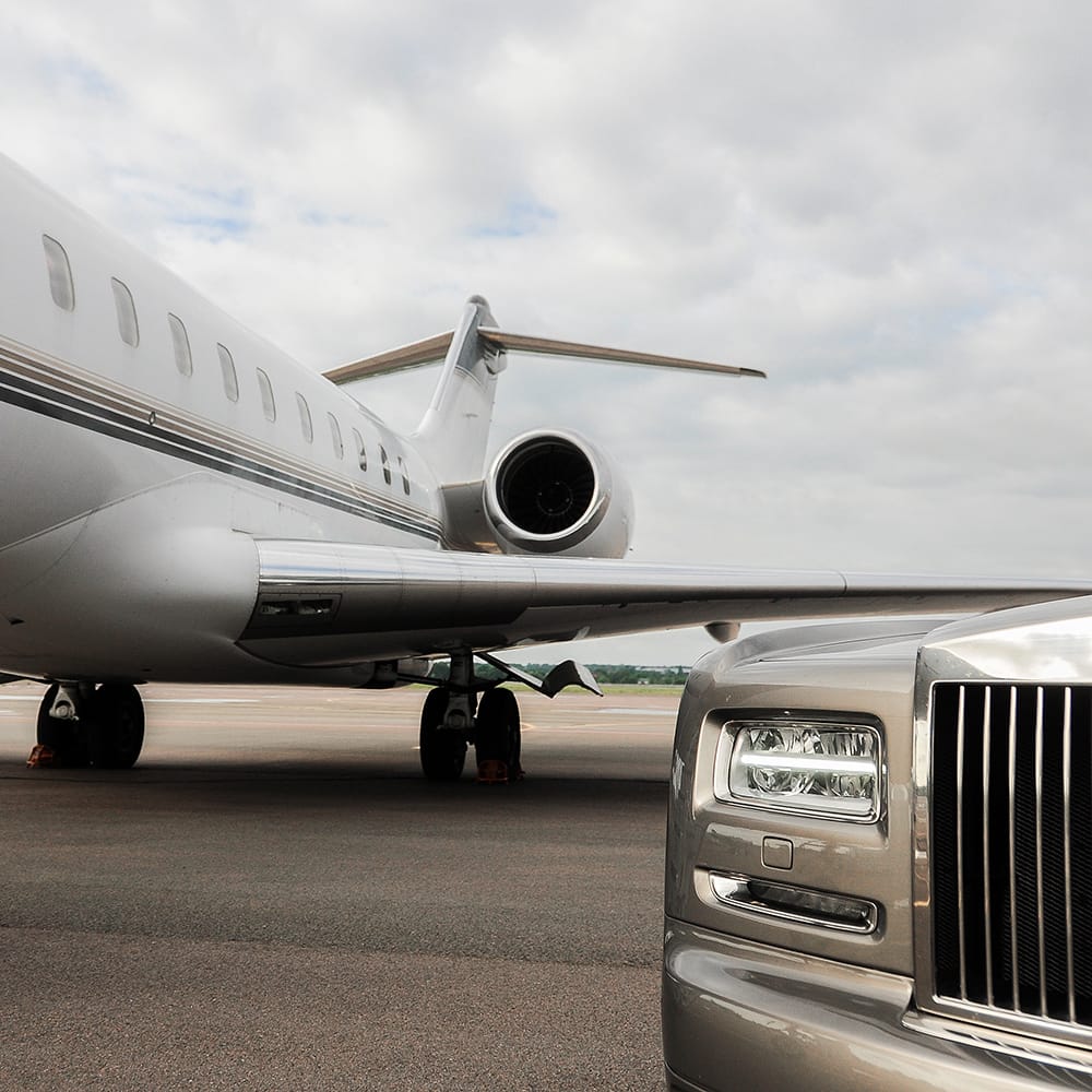 airport car & limo service stay behind plane