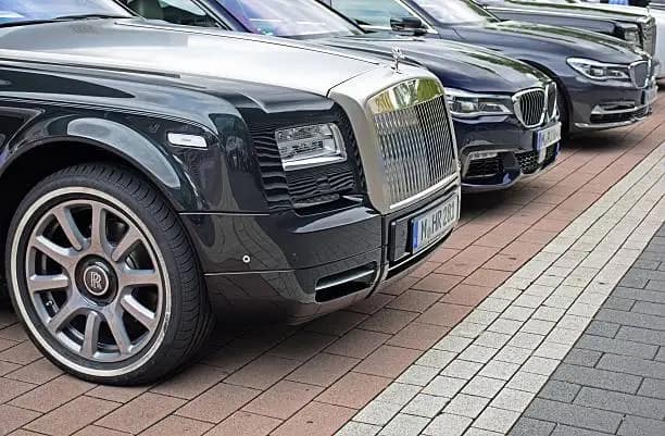 rolls royce limo stands in garage of luxury limo NYC