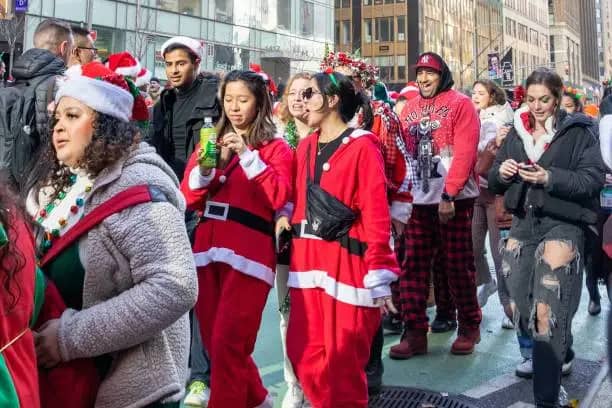 People walking in street at Christmas in New York